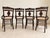 A matched set of four late-19th-century Victorian Eastlake armchairs, American, circa 1880–1900. Each chair features a...