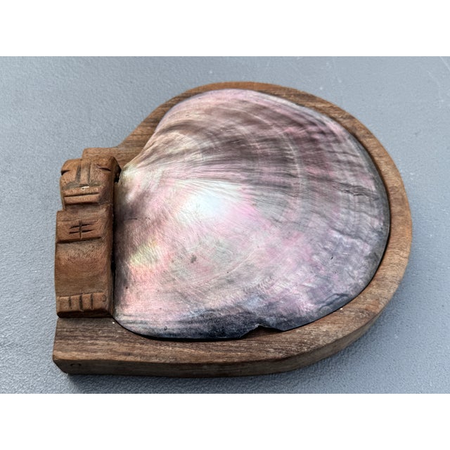 Offering for sale this incredible abalone shell lidded cigarette box with the following features: - The design is...