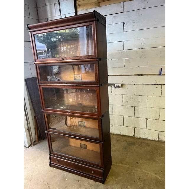 Early 20th Century Globe -Wernicke Antique Tiger Oak Five Stacking Bookcase Mixed pattern, 1 drawer with dovetail joint...