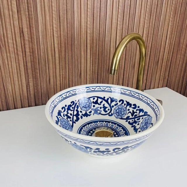 1) Moroccan Artistic Bathroom Sink Top, a true masterpiece of craftsmanship that seamlessly blends artistry and...