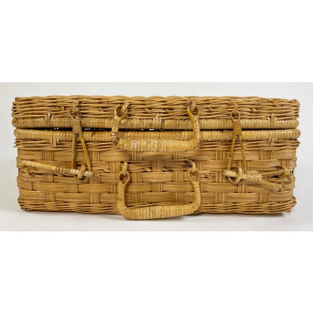 Show up in style with this vintage lidded woven wicker basket with suitcase-style closure featuring bamboo hook holds and...