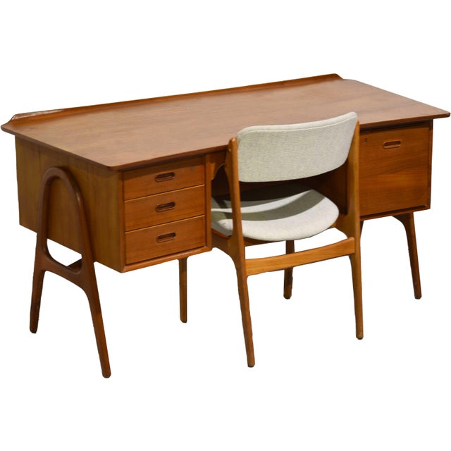 A study in clean lines and quiet craftsmanship, this 1970s Danish desk by Svend Aage Madsen pairs beautifully with its...