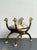 This striking Egyptian Revival curule seat is a masterwork of antiquity-inspired design, featuring a classic X-frame...