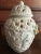 Lidded ceramic ginger jar shaped potpourri holder. It has cutouts to allow the aroma of potpourri to diffuse. Ivory...