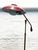 Attributed Gerald Thurston articulating saucer brass and enamel floor lamp for Lightolier. Brass and maroon enamel. Angle...