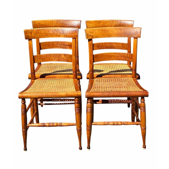Bay Colony Antiques is proud to offer for sale this fantastic early 19th century antique set of 4 Tiger Maple dining...