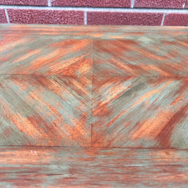 Colorful and rustic, this vintage side table gives off the perfect amount of Southwestern Farmhouse vibe. Pair her with a...