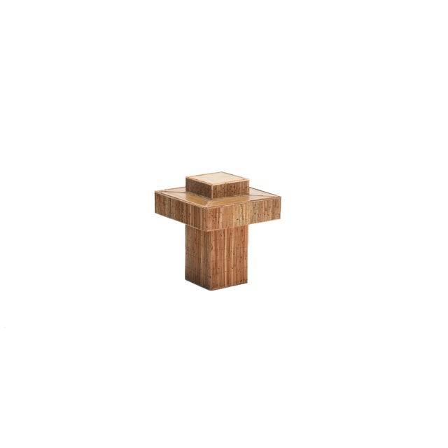 A sculptural statement in geometric form, this side table reimagines the classic prism through a mid-century lens. Its...