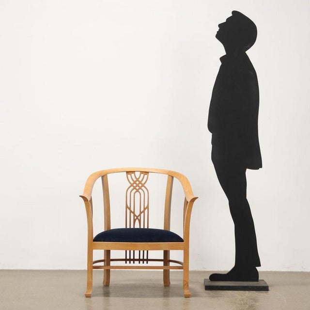 Natural beech wood armchair, foam seat with velvet upholstery. Completely restored. This piece is attributed to the...