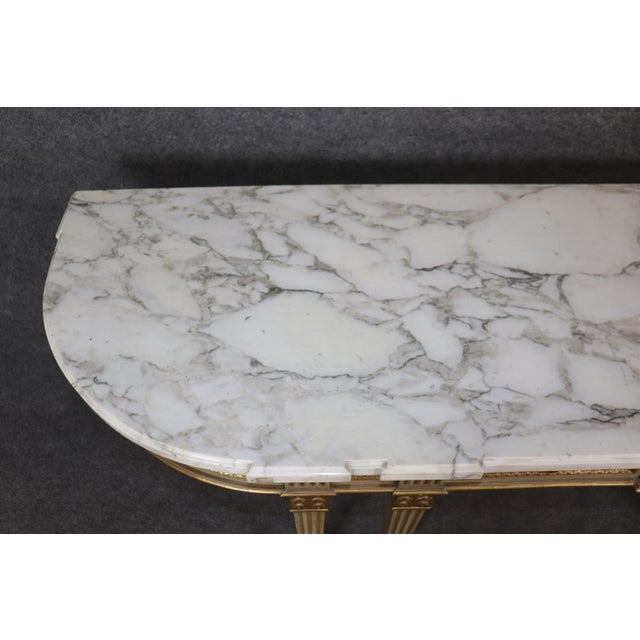 This exquisite French console table attributed to the renowned Maison Jansen embodies the refined elegance and...