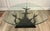 Here is a fabulous 1970s Brutalist coffee table featuring a dramatic sculptural flock of birds in flight supporting a...