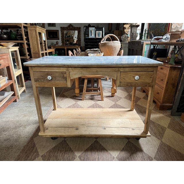 Handcrafted from reclaimed wood, this newly made rustic island brings warmth, character, and functionality to any kitchen,...