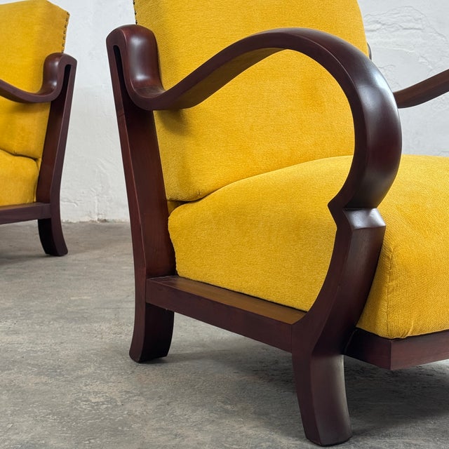 This pair of armchairs is a stunning example of hungarian art deco design, produced in the 1940s by the renowned debreceni...