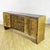 This imposing art deco sideboard, dating back to the 1930s, embodies the sophisticated elegance of turn-of-the-century...