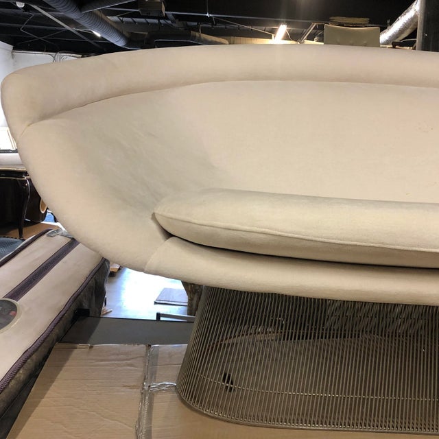 Rare Warren Platner attributed settee in classic nickel wire reupholstered in white chenille.