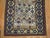 An early 20th century Caucasian Kuba rug with a geometric design in green and blue Measures: 3'7" x 6'1" This captivating...