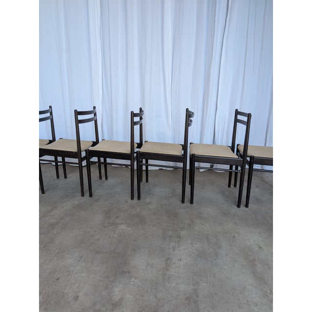 Set of 6 vintage dining chairs produced by STOL Kamnik in Yugoslavia during the 1970s. The chairs feature a clean and...