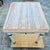 This is a charming old pine table with a newer Gustavian Swedish farmhouse style off-white milk painted finish. The table...