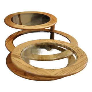 1970s Mid Century Modern Oak Swivel Round Coffee Table With Triple Tier Smoke Glass For Sale