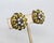 1960s round goldtone olive green beads with white and clear accent beads clip earrings. Marked "ORNELLA MADE ITALY" on the...