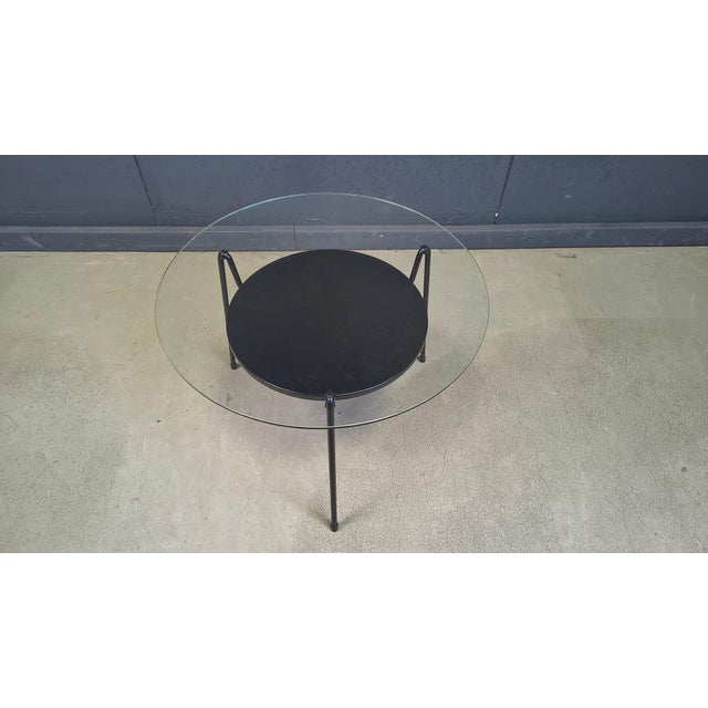 Mid century modern Mug coffee table (mosquito in dutch) designed by Wim Rietveld for Gispen. Black 3-legged table with...