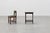 An elegant English side table from around 1900, crafted in solid oak with a rich, dark patina. The table features a...