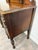 This is a gorgeous antique Art Nouveau walnut vanity featuring its original adjustable mirror, dovetailed drawers, brass...