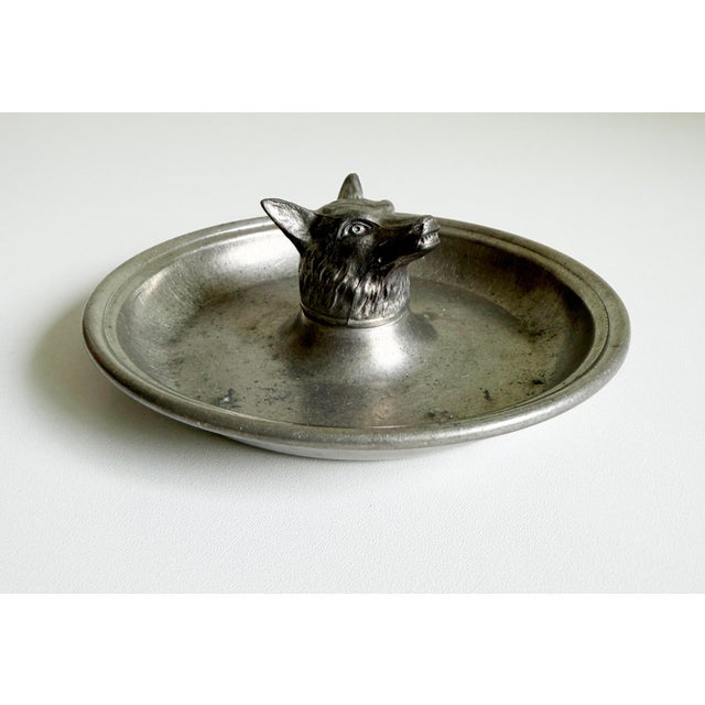 A pewter ashtray catchall dish that blends rustic and refinement. Featuring a gentleman's hunting lodge and equestrian...