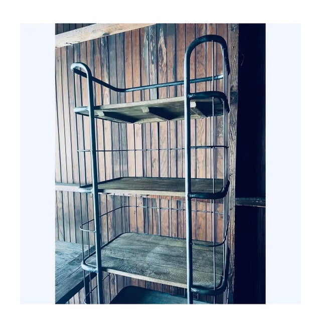 RH has repurposed the design of a rolling baker's rack from the early 20th century, a time when commercial bakeries let...