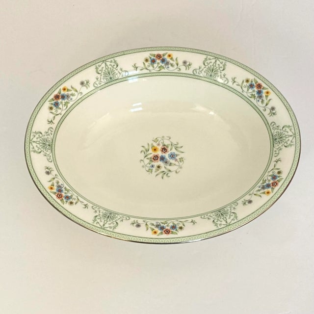 Classic Wedgwood bone china in the elegant Agincourt Green pattern, featuring a winter-white ground bordered in soft green...