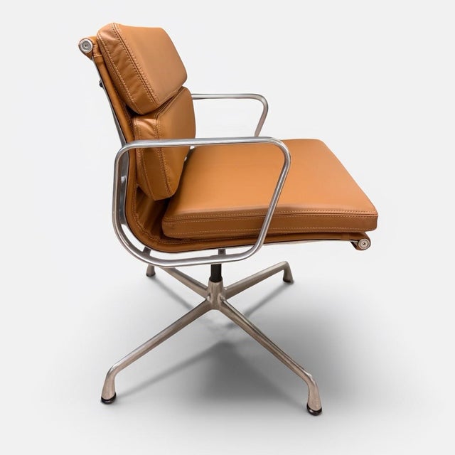 A timeless Mid-Century Modern design, this Eames Aluminum Group Side Chair with Arms combines clean lines, lasting...