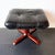 This rare ikea lindos footstool from 1997 is a scandinavian modern design featuring black leather upholstery and a...