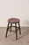 19th-century oak joint stool with a rectangular plank top, square legs, and box stretchers, constructed using traditional...