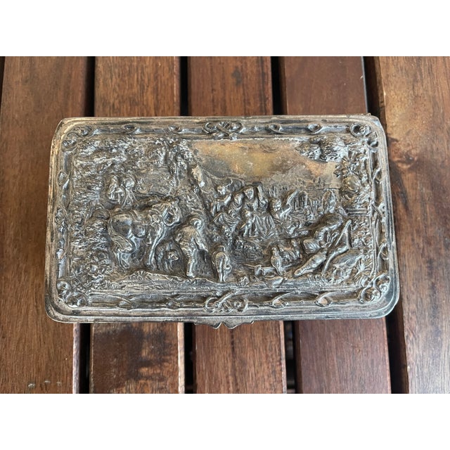 I purchased this wonderful silver plated box quite a number of years back. It just about works with everything. I special...