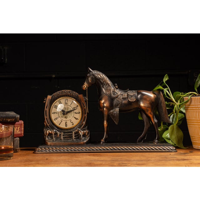 c. 1940s-1950s; The Lanshire Clock and Instrument Company - Chicago Western‑themed novelty electric mantel clock on a...