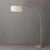 Satin nickel steel paired with a satin nickel base defines the Float Arc Lamp, a modern arc lamp designed by Peter Morelli...