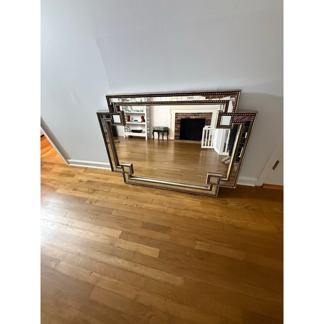 Striking John-Richard Collection Mosaic Mirror featuring a large clear center mirror surrounded by an architectural...