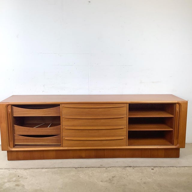 Bernhard Pedersen & Søn has been producing furniture from its Danish workshop since 1902, and the teak tambour door...