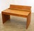 A refined mid-century modern writing desk featuring richly figured teak veneer, clean architectural lines, and a...