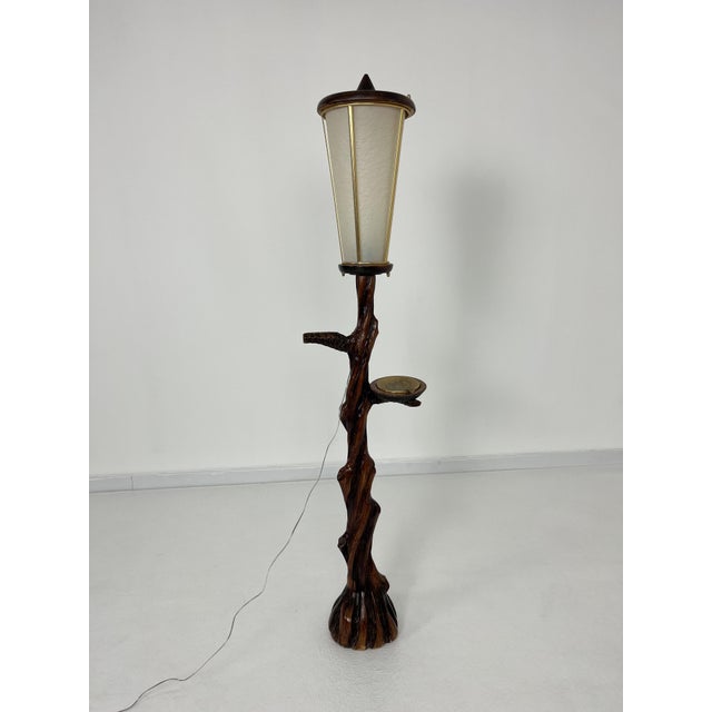 Floor lamp in the style of Aldo Tura, 1950s Complete and in good condition. Wood, parchment and brass. E 27 lamp This...