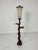 Floor lamp, 1950s Complete and in good condition. Wood, parchment and brass. E 27 lamp European Plug (up to 250V).The...