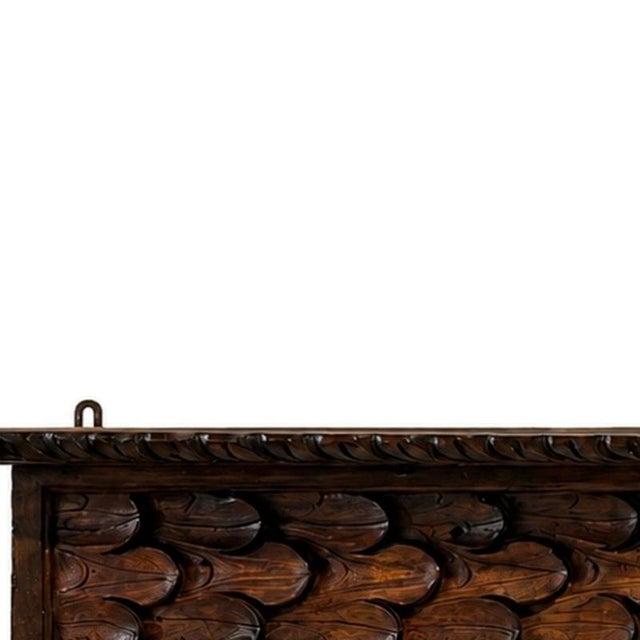 Sacred Art - Large Corbel - 19th Century. Portuguese, 19th century; carved in chestnut wood. Dimensions: 22 cm x 93 cm x...