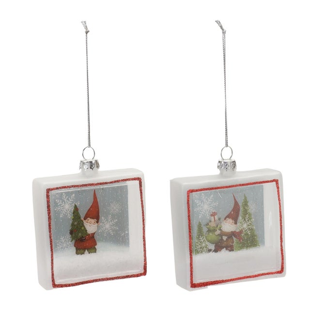 Bring the magic of the season to life with our Glass Gnome Shadow Box Ornaments. This enchanting collection features...
