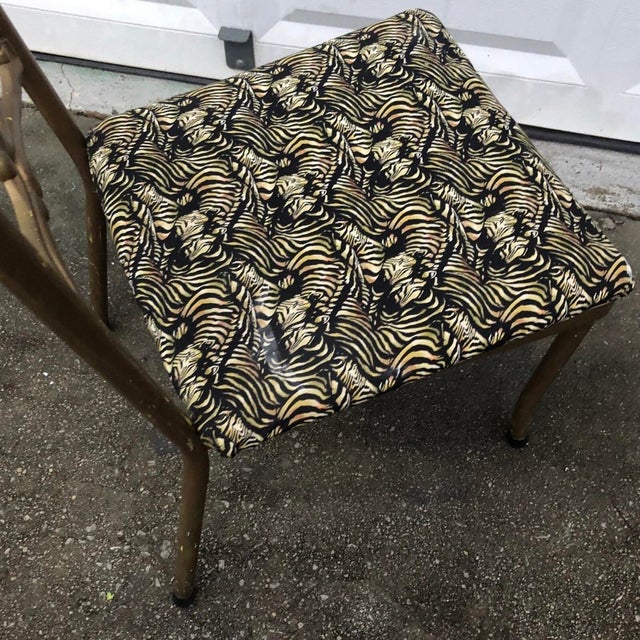 Up for consideration is a beautiful vintage pair of Italian gilded gold chairs with zebra cushions. These would look...