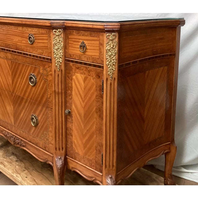 Antique French satinwood dresser or sideboard with Bronze Mounts. This piece has been used as a dresser for years. Book...