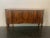 Wavy moved sideboards, with 2 doors on the sides and 3 drawers in the center. The feet finely carved in elongated pine...