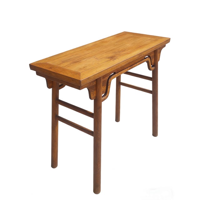 This elegant altar table is made from solid elm wood, featuring a rectangular top with subtle everted flanges. The design...