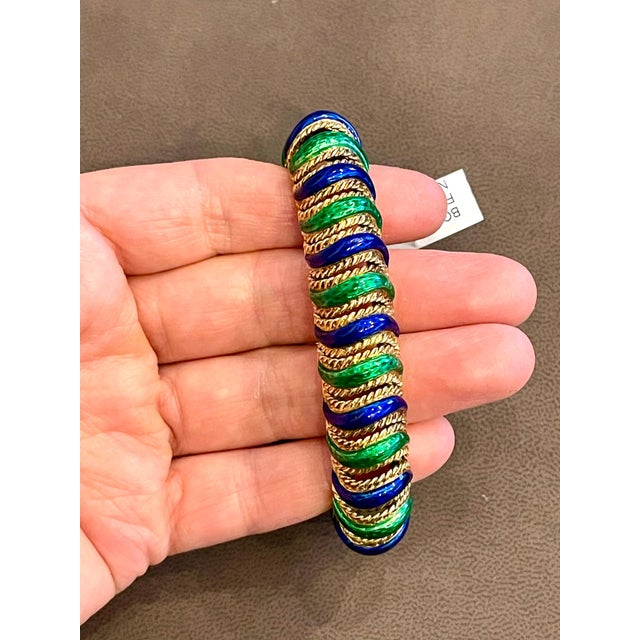 Very Heavy Bangle featuring intricate workmanship with Green and Blue Enamel and 18 K gold 7 inches in length, 1 and 1/2...