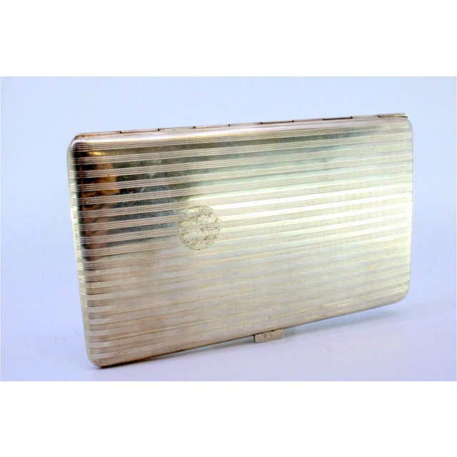 Silver Cigarette Case with Top Trim and Gilt Interior, in Good conditions.