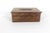 Lovely carved wood trinket box with brass inlay. The hinged lid opens easily. Good size perfect for jewellery, or to stash...
